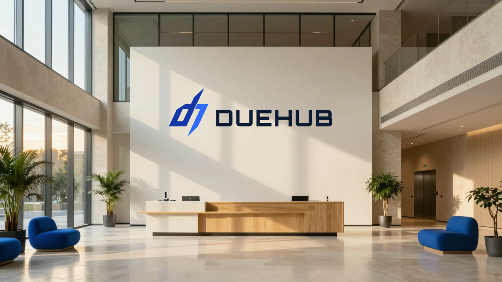 La recepción del edificio: un mostrador de roble y, detrás, una pared blanca con el logo de DueHub.